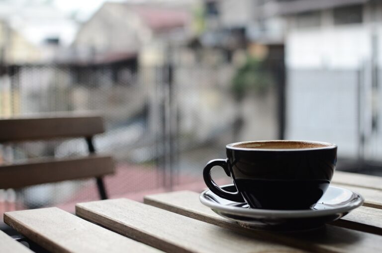 coffee cup sitting on wooden table